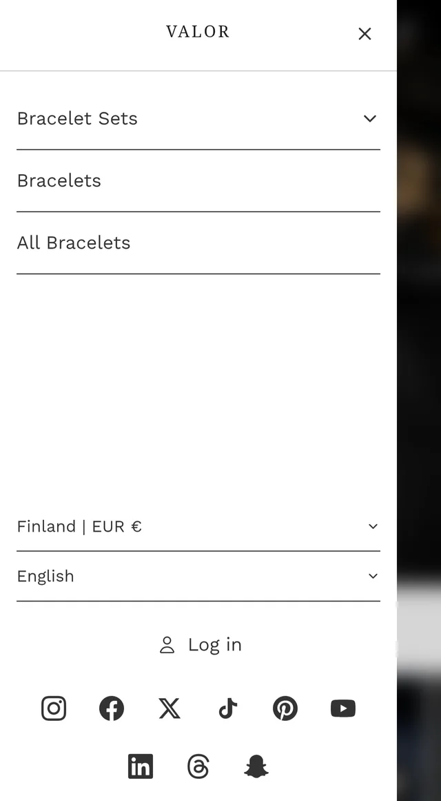 Valor theme — mobile menu drawer with collections and social links
